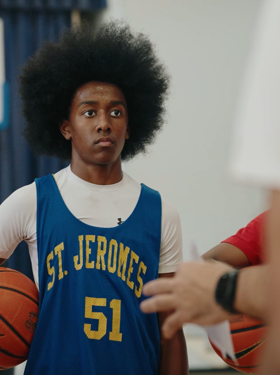 Young player in St. Jeromes jersey